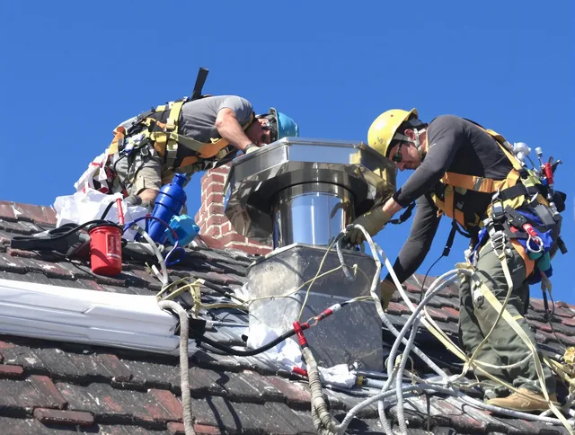 Protective chimney cap installed by Norwich Chimney Sweep in Norwich, CT